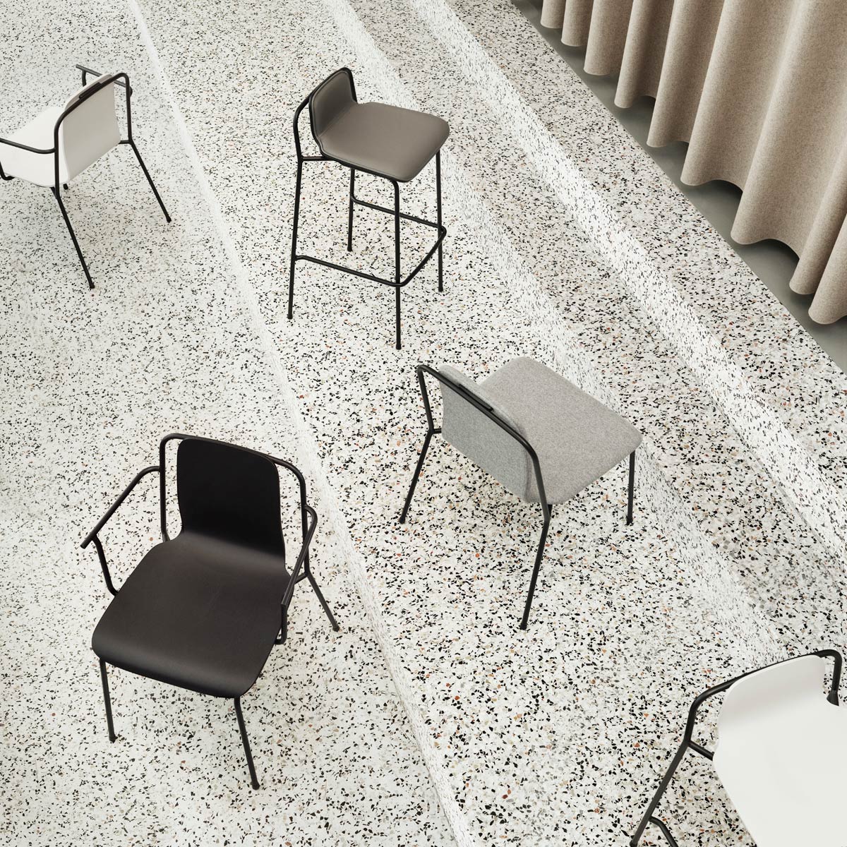 Studio Armchair by Normann Copenhagen, showing studio armchairs in live shot.