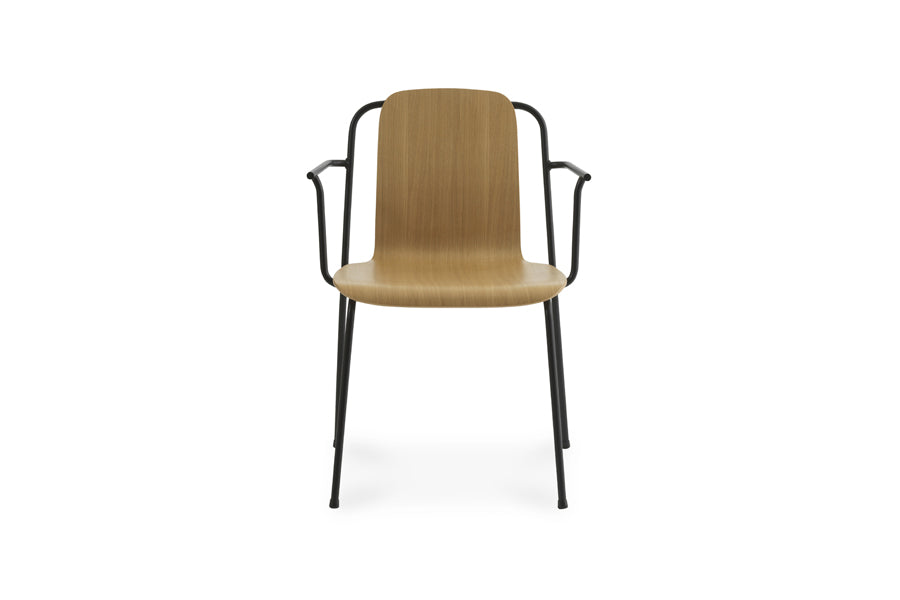 Studio Armchair by Normann Copenhagen, showing front view of studio armchair in oak lacquered veneer wood shell.