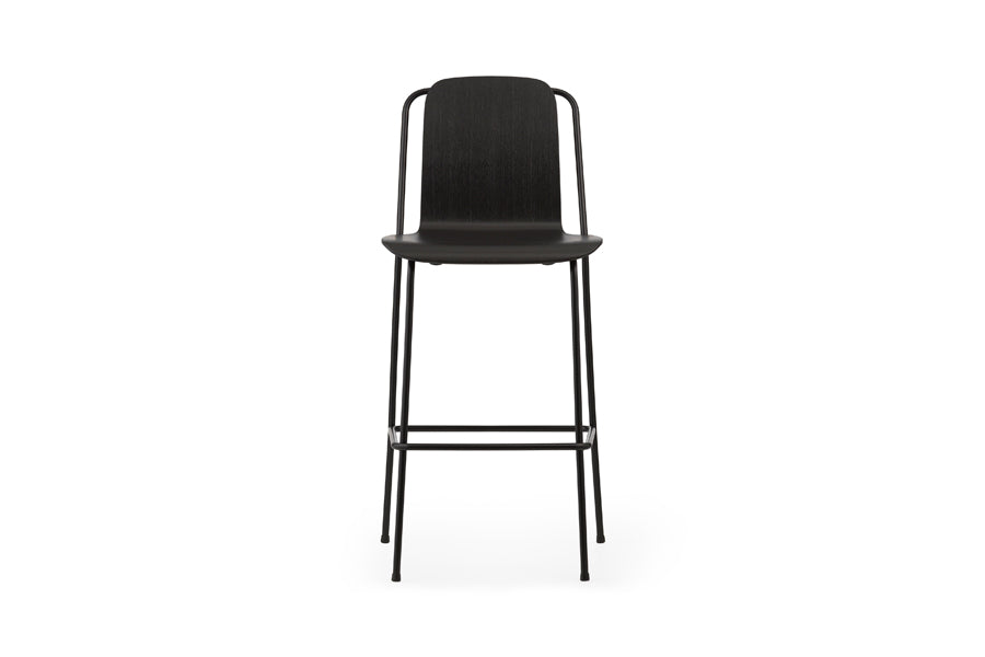 Studio Bar Chair by Normann Copenhagen, showing front view of studio bar chair in 45" high/black painted lacquered ash veneer wood shell.
