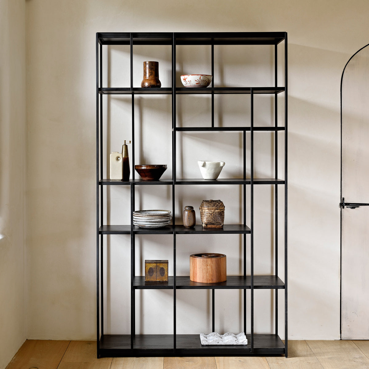 Studio Rack by Ethnicraft, showing front view of teak rack no doors in live shot.