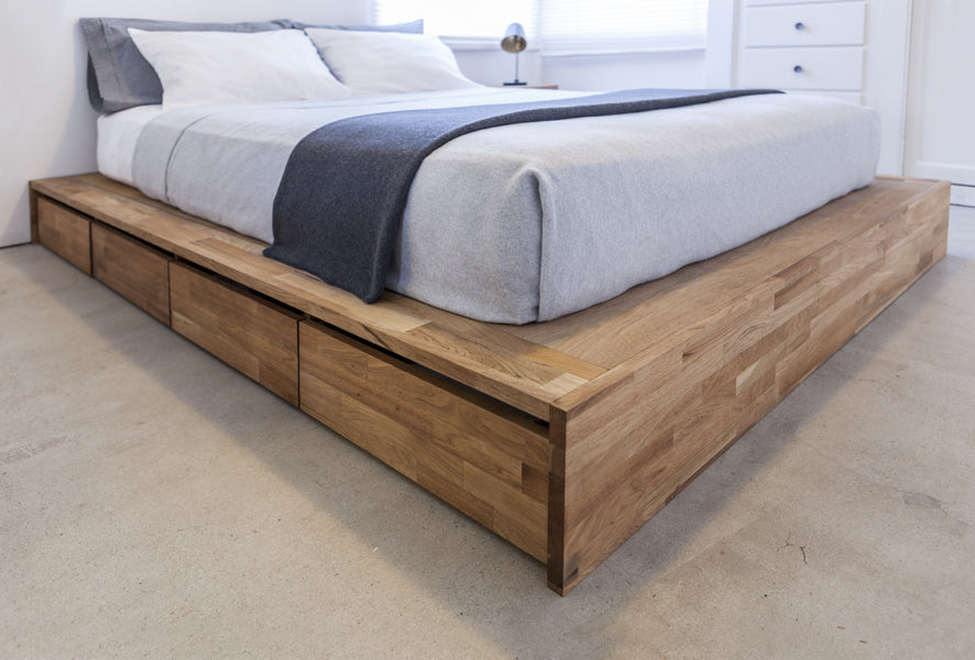 LAX Storage Platform Bed by MASHstudios, shown in solid english walnut frame and drawers.