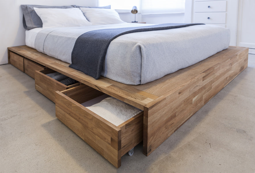 LAX Storage Platform Bed by MASHstudios, shown in natural oil finish.