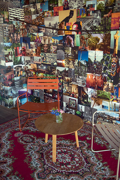 Surprising Low Armchair by Fermob, showing live shoot of the chair with table.