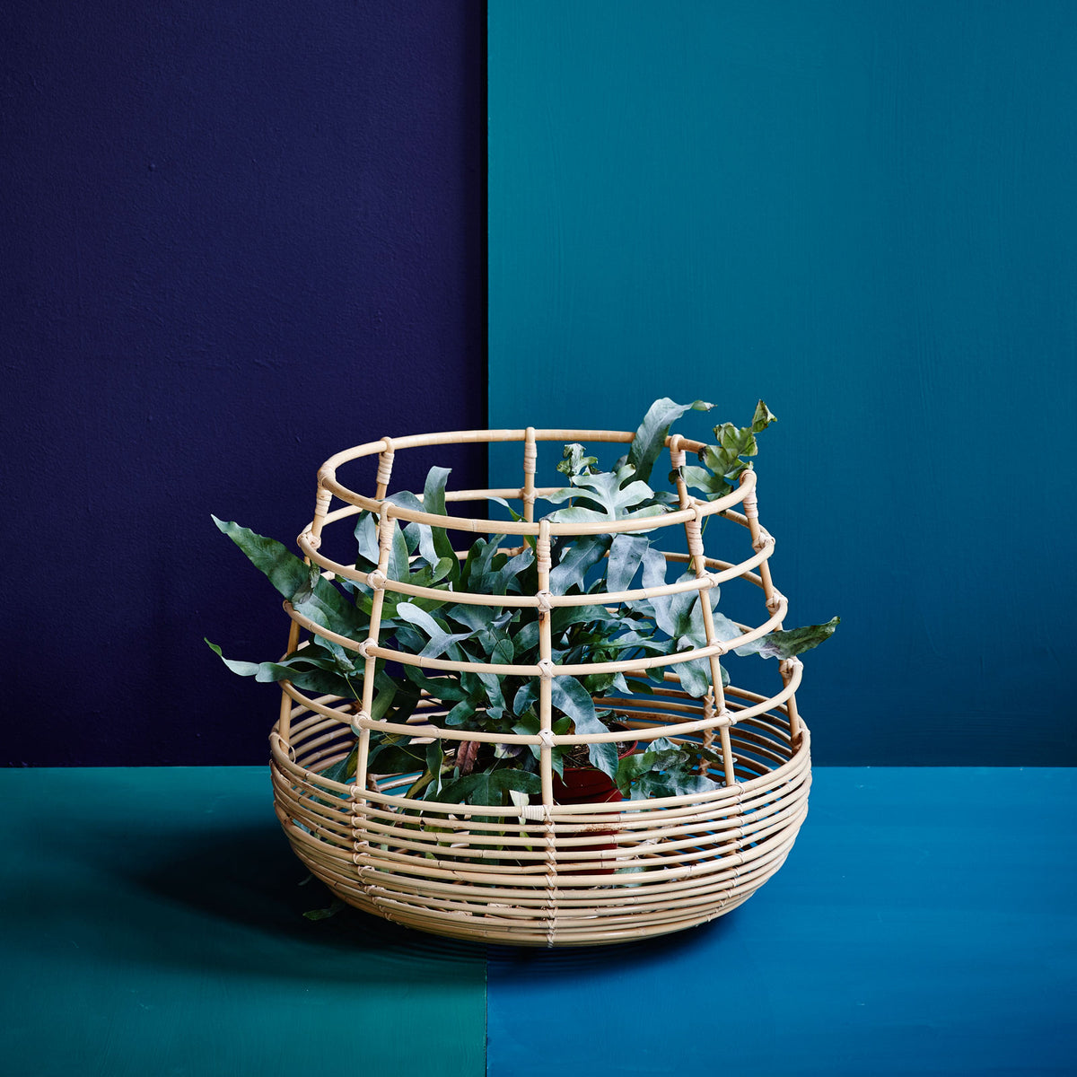 Sweep Rattan Basket by Cane-Line, showing sweep rattan basket in live shot.