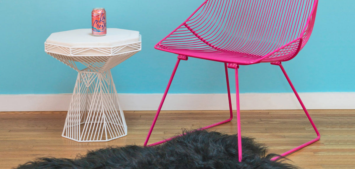 Switch Stool/Table by Bend, showing switch stool/table with chair in live shot.