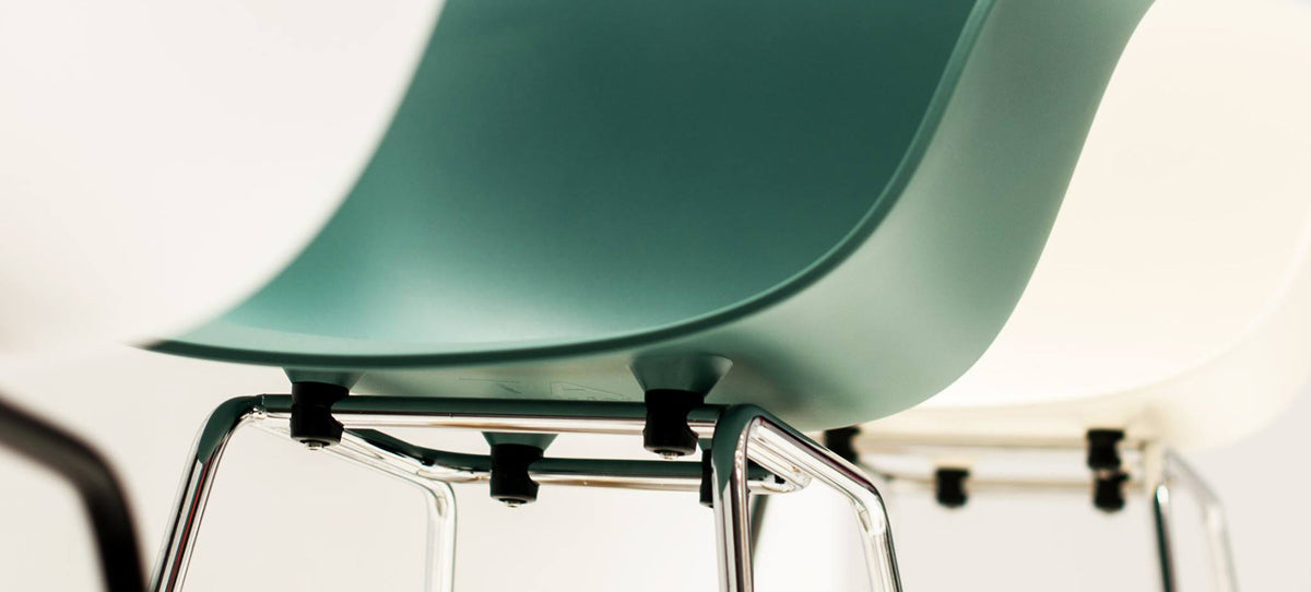TA Arm Chair Er Chrome Base by Toou, showing ta arm chair er chrome base in live shot.