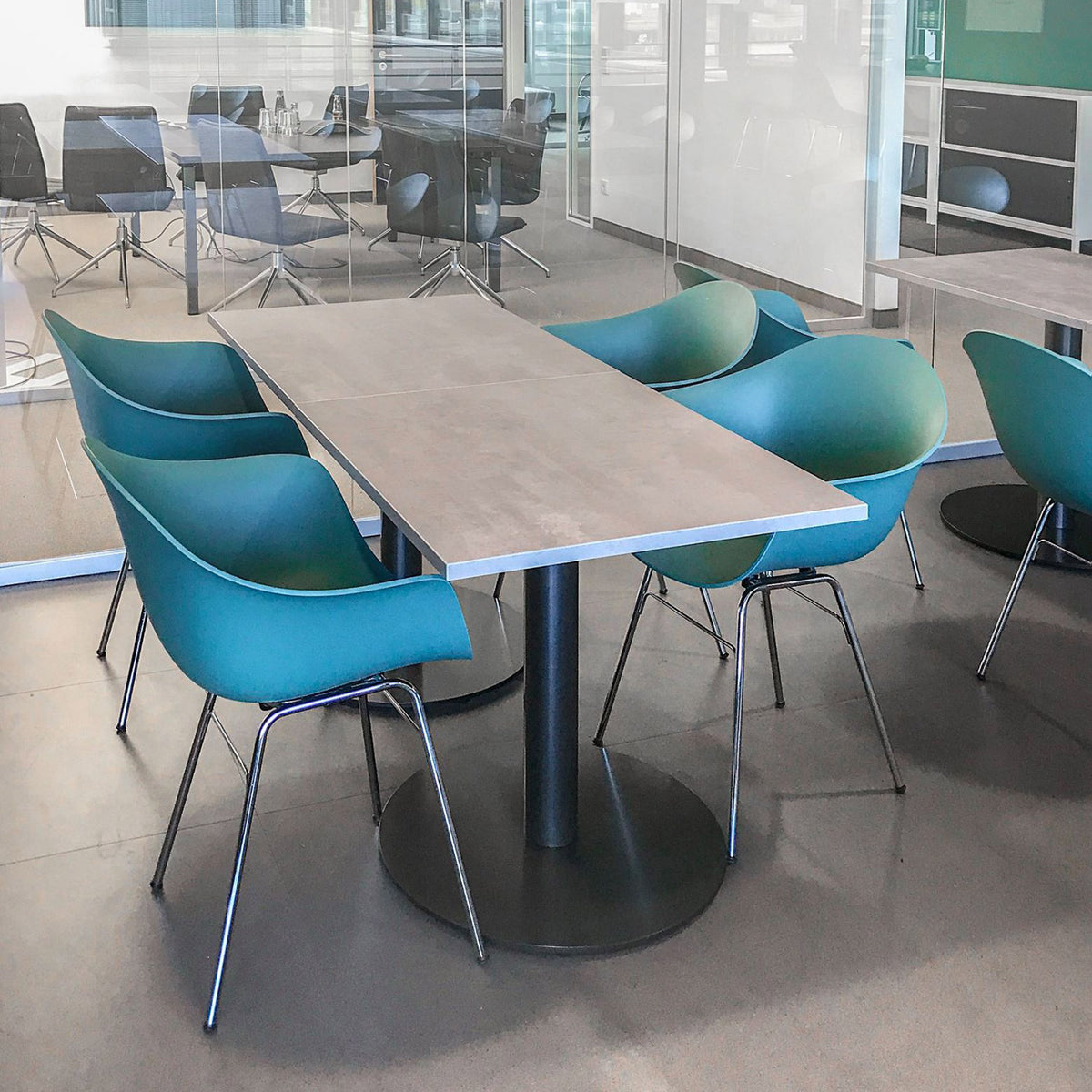 TA Arm Chair Er Chrome Base by Toou, showing ta arm chairs er chrome base in live shot.