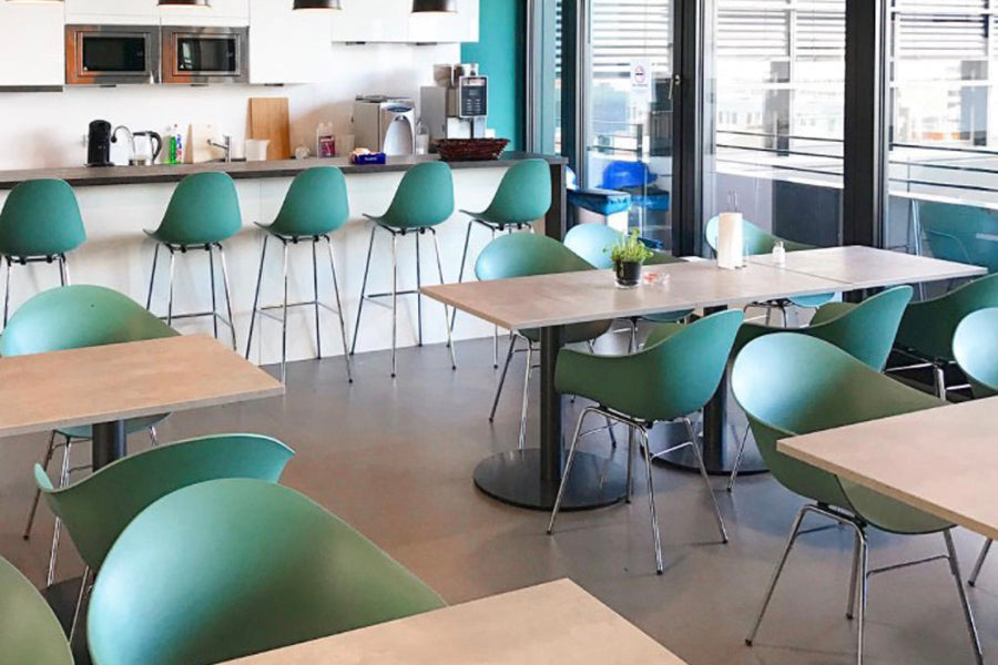 TA Arm Chair Er Chrome Base by Toou, showing ta arm chairs er chrome base in live shot.
