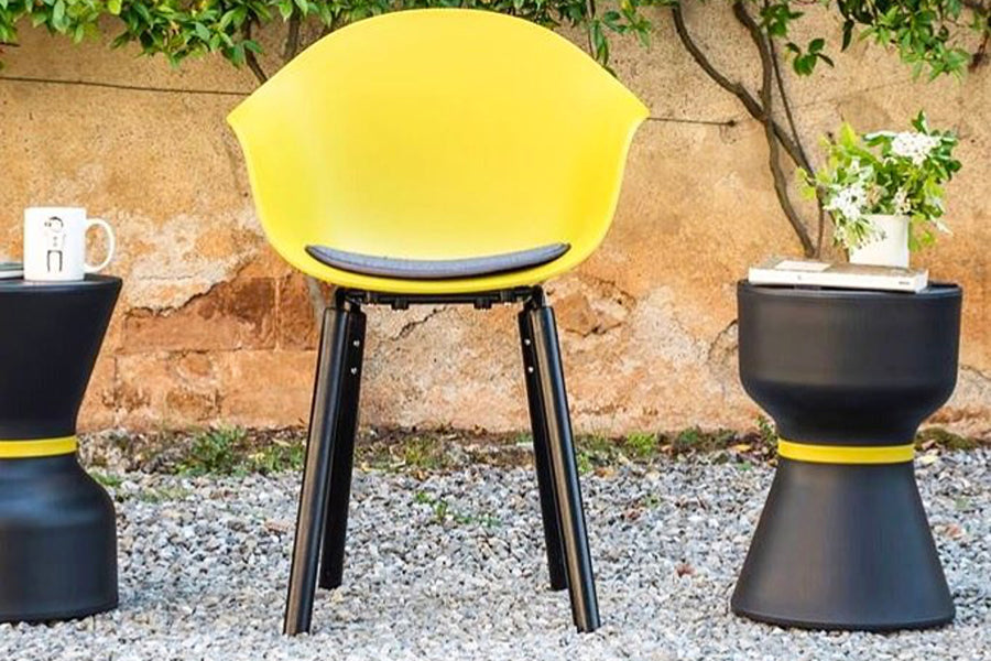 TA Arm Chair Yi Black Oak Base by Toou, showing ta arm chair yi black oak base in live shot.