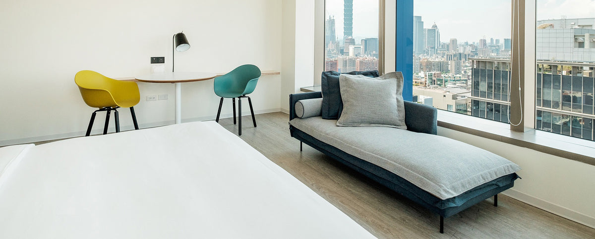TA Arm Chair Yi Black Oak Base by Toou, showing ta arm chairs yi black oak base in live shot.