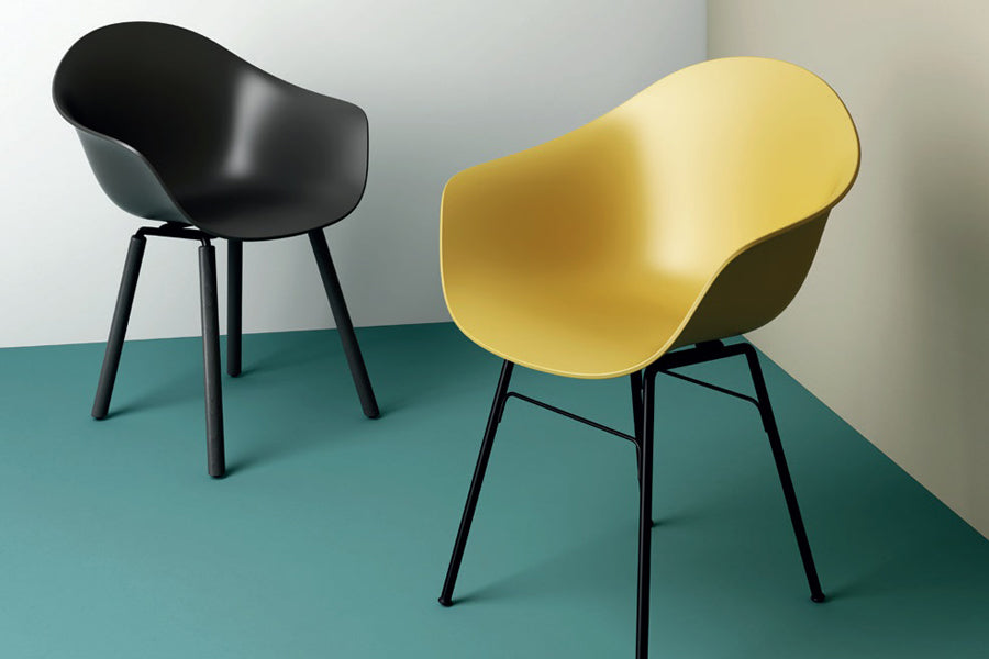 TA Arm Chair Yi Black Oak Base by Toou, showing ta arm chair yi black oak base in live shot.
