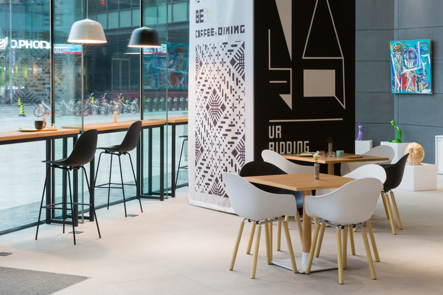 TA Arm Chair Yi Natural Oak Base by Toou, showing ta arm chairs yi natural oak base in live shot.