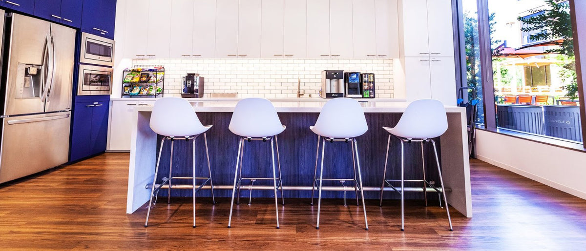 TA Bar Stool Black Base by Toou, showing ta bar stools in live shot.