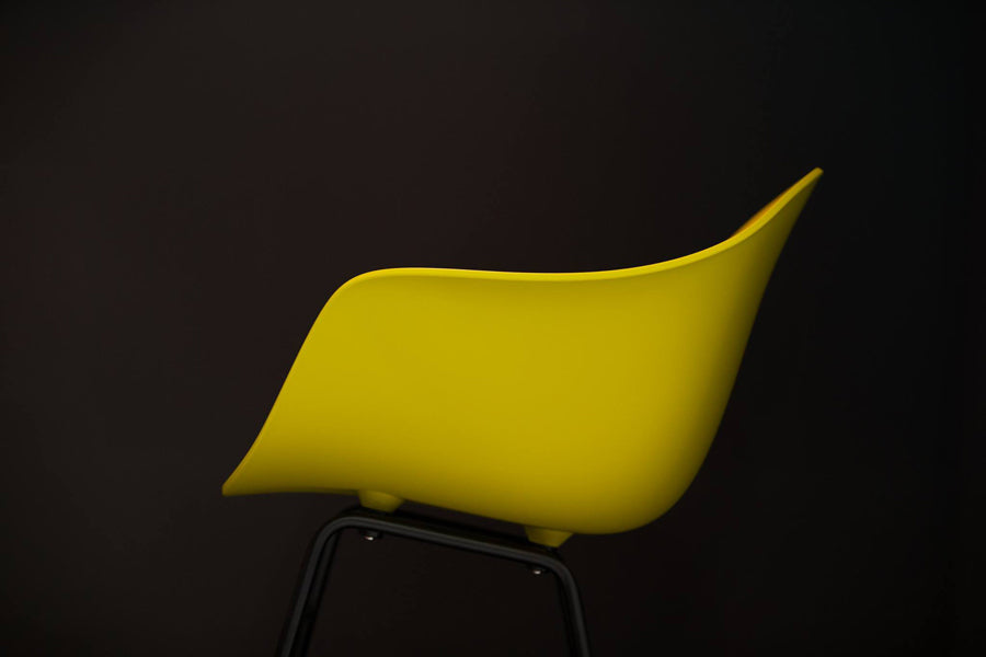TA Rocking Chair Black Metal & Wood Base by Toou, showing closeup view of ta rocking chair black metal & wood base in live shot.