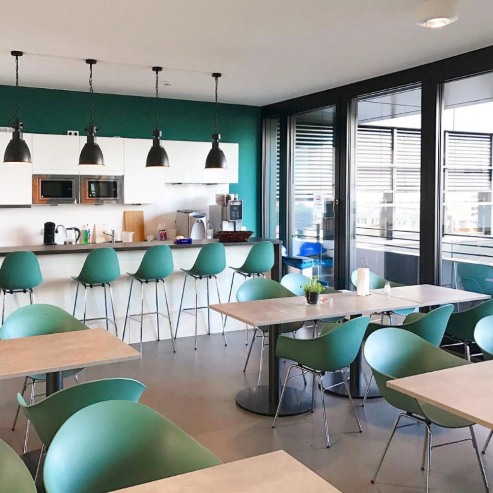 TA XL Bar Stool Chrome Base by Toou, showing ta xl bar stools chrome base in live shot.
