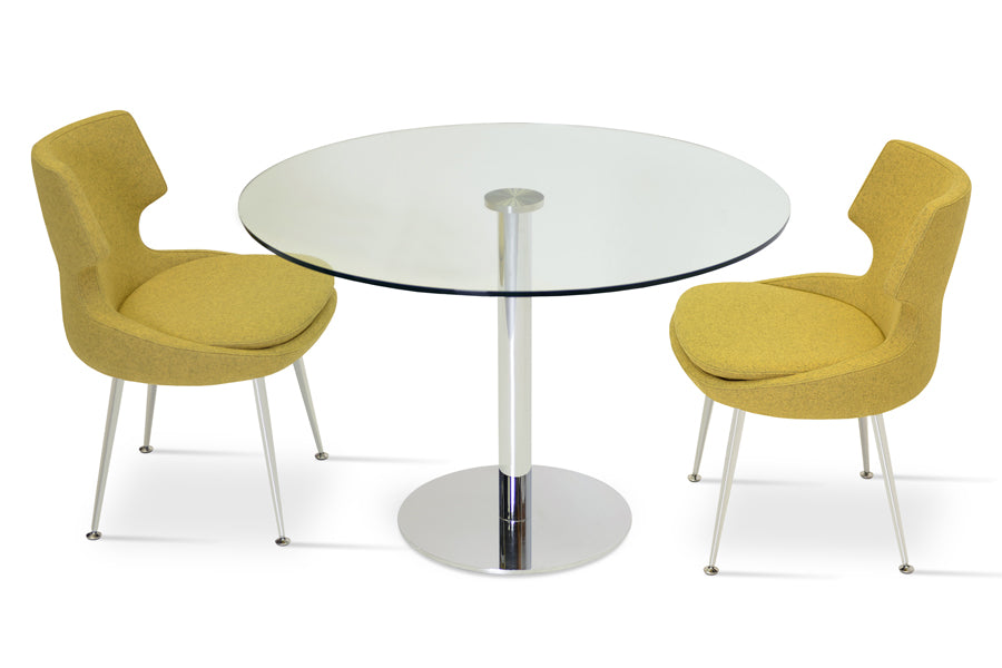 Tango Dining Table by SohoConcept, showing tango dining table with chairs.