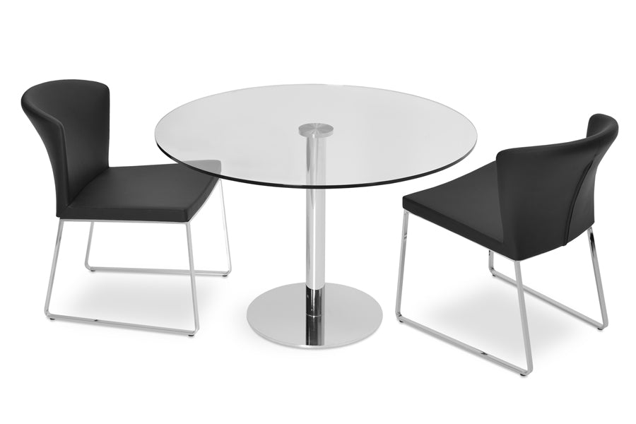 Tango Dining Table by SohoConcept, showing tango dining table with chairs.