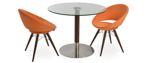 Tango Dining Table by SohoConcept, showing tango dining table with chairs.