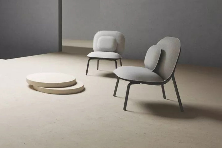 Tasca Lounge Chair w/ Pillow by Toou, showing tasca lounge chairs w/ pillows in live shot.