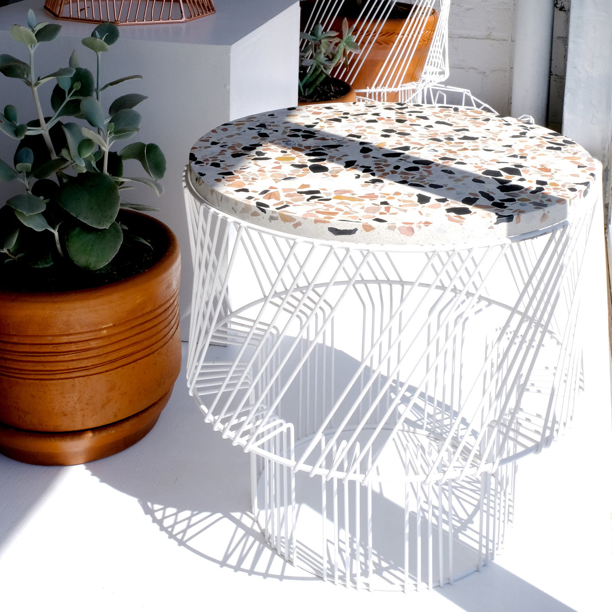 Terrazzo Side Table by Bend, showing terrazzo side table in live shot.