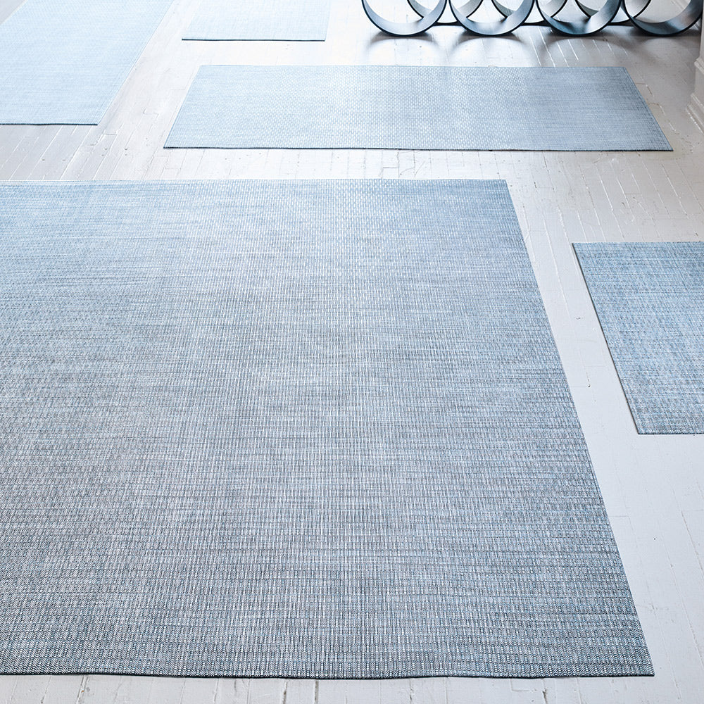 Thatch Woven Floor Mat by Chilewich, showing thatch woven floor mat in live shot.