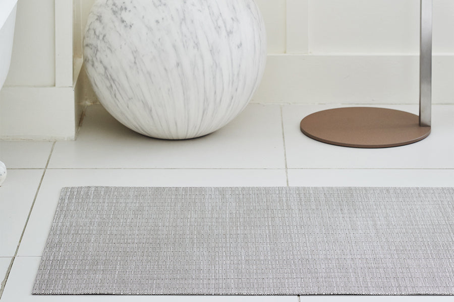 Thatch Woven Floor Mat by Chilewich, showing thatch woven floor mat in live shot.