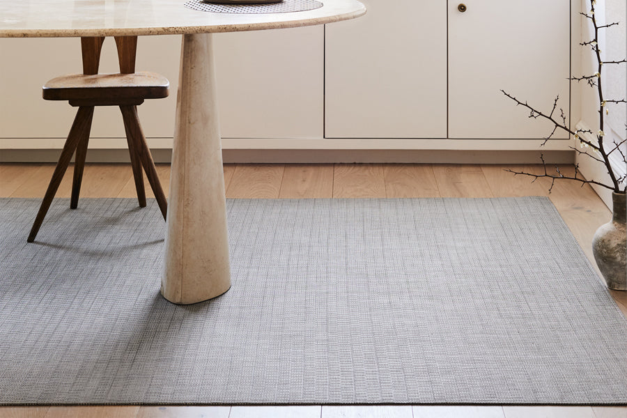 Thatch Woven Floor Mat by Chilewich, showing thatch woven floor mat in live shot.