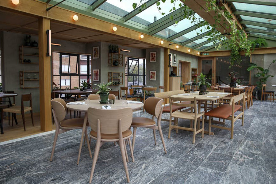 The Dining Chair by Mater, showing the dining chairs with tables in live shot.