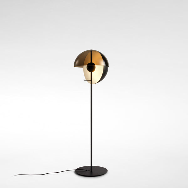 Theia Floor Lamp by Marset, showing angle view of black floor lamp.