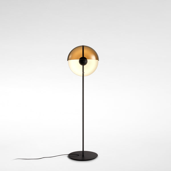 Theia Floor Lamp by Marset, showing front view of black floor lamp.