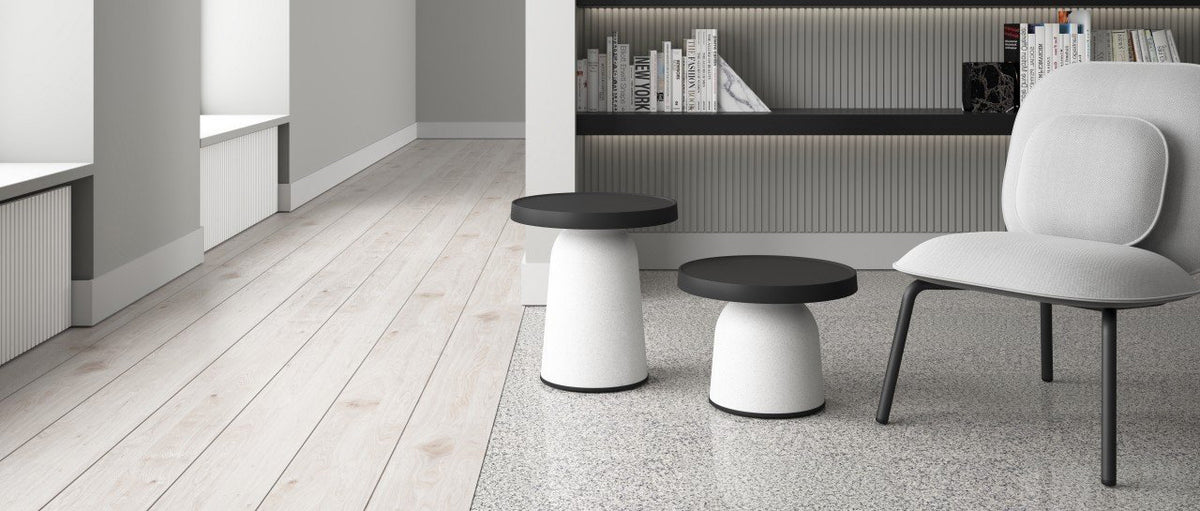 Thick Top Side Table by Toou, showing thick top side tables with chair in live shot.