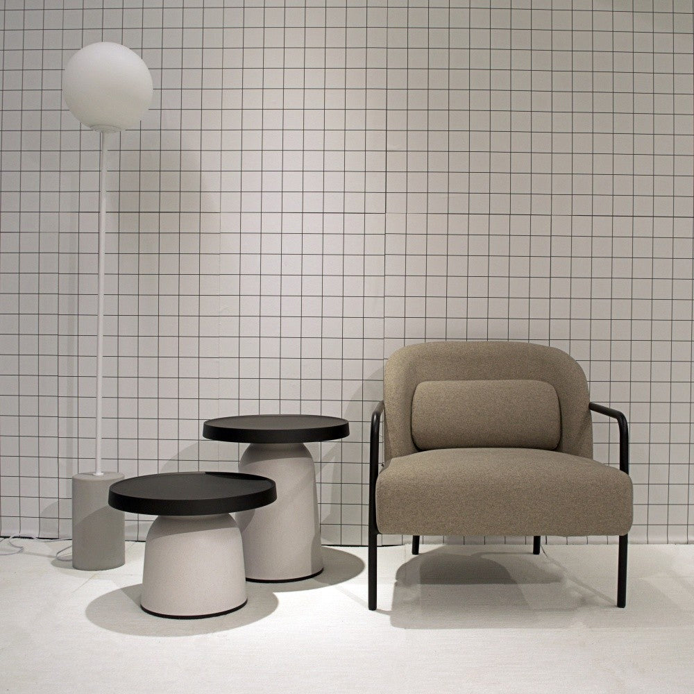 Thick Top Side Table by Toou, showing thick top side tables with chair in live shot.