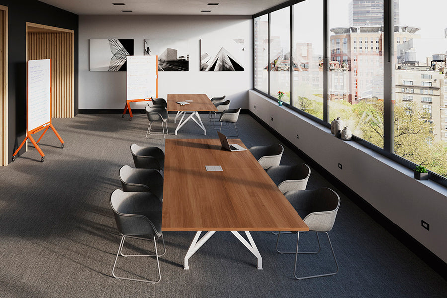 Think Tank Conference Table by Scale 1:1, showing think tank conference tables with chairs in live shot.