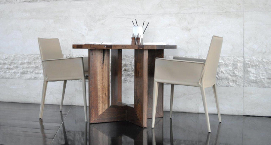Tiffany Armchair by SohoConcept, showing two arm chairs with table in live shot.