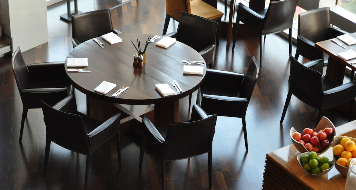Tiffany Armchair by SohoConcept, showing arm chairs with table in live shot.