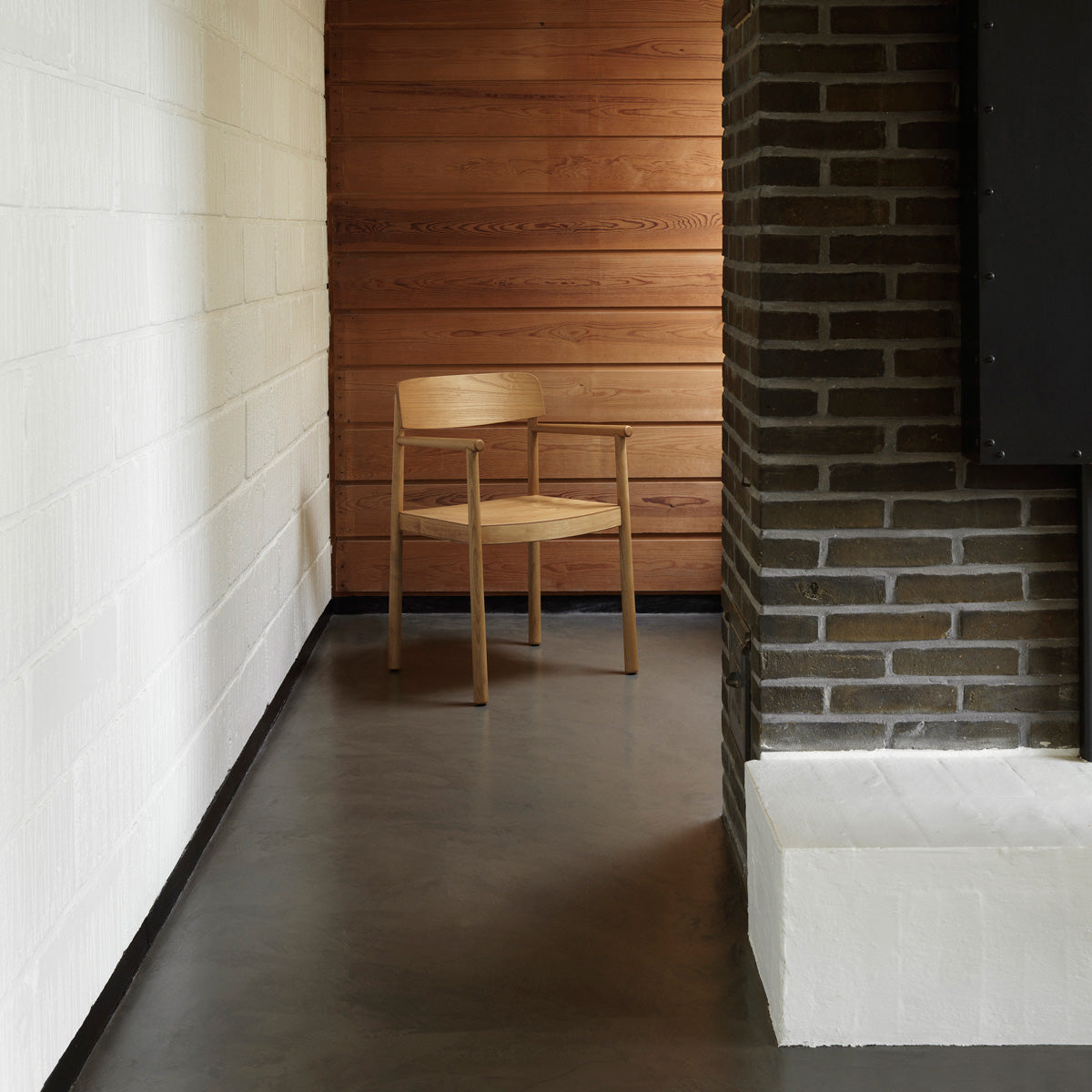 Timb Armchair by Normann Copenhagen, showing timb armchair in live shot.