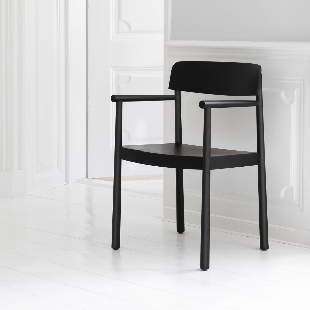 Timb Armchair by Normann Copenhagen, showing timb armchair in live shot.
