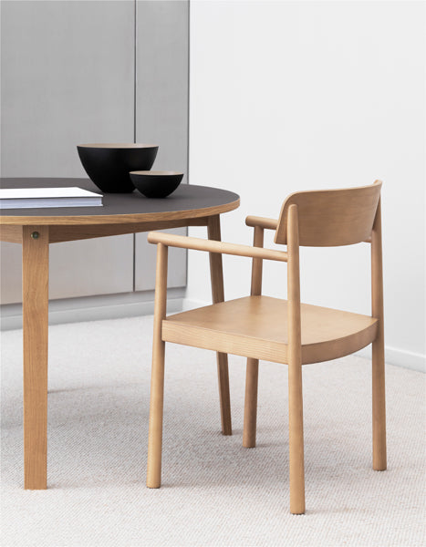 Timb Armchair by Normann Copenhagen, showing timb armchair in live shot.