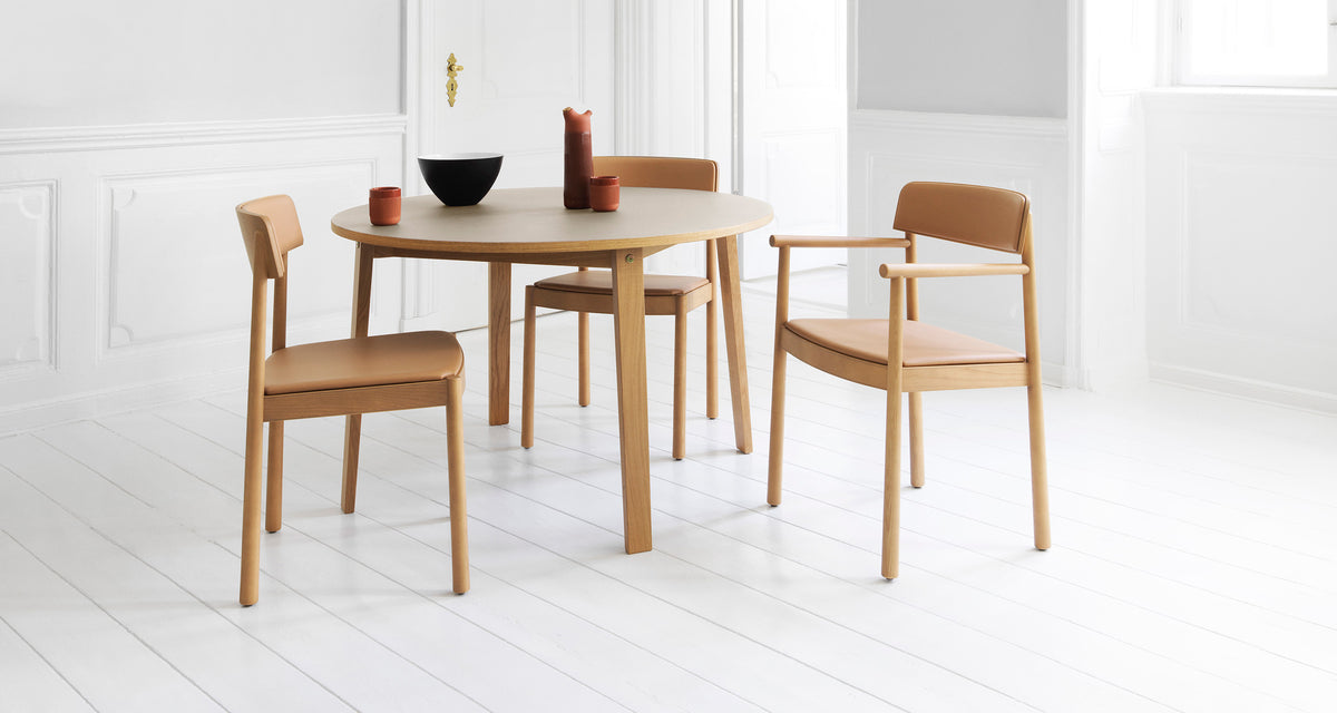 Timb Chair by Normann Copenhagen, showing timb chairs in live shot.