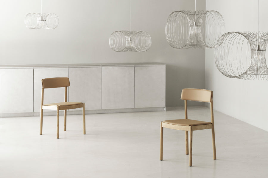Timb Chair by Normann Copenhagen, showing timb chairs in live shot.