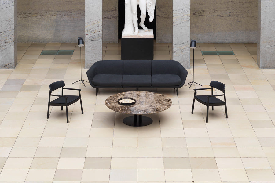 Timb Lounge Armchair by Normann Copenhagen, showing timb lounge armchairs in live shot.