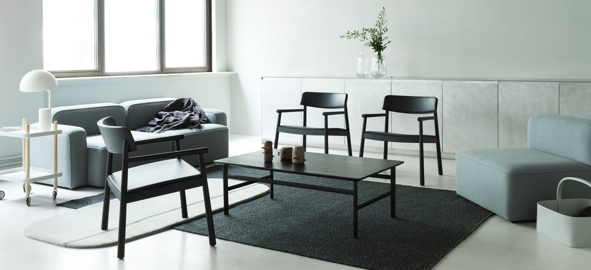 Timb Lounge Armchair by Normann Copenhagen, showing timb lounge armchairs in live shot.