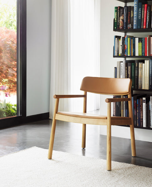 Timb Lounge Armchair by Normann Copenhagen, showing timb lounge armchair in live shot.