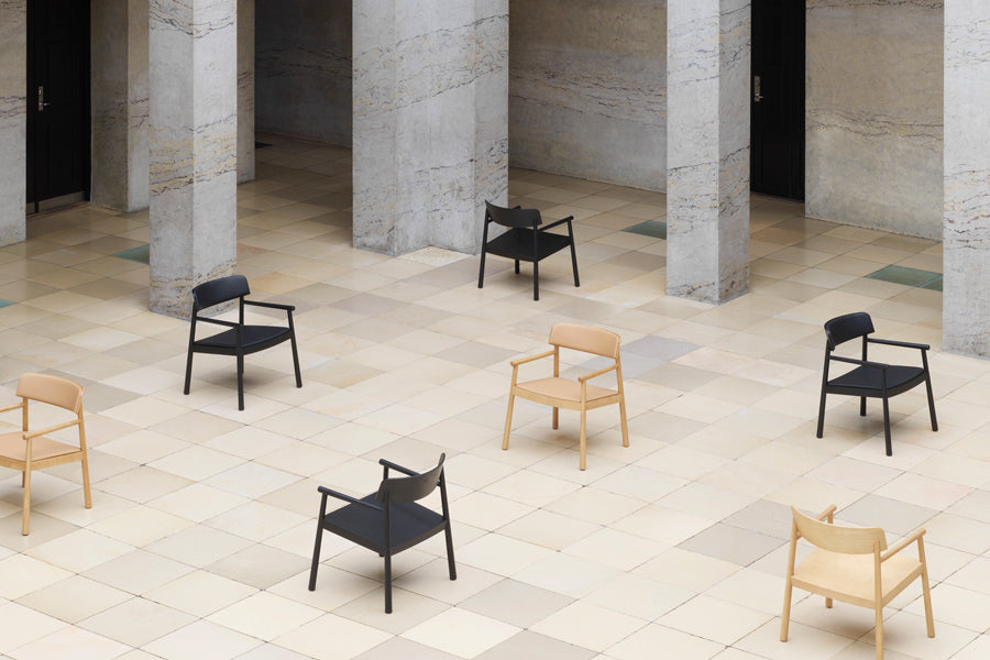 Timb Lounge Armchair by Normann Copenhagen, showing timb lounge armchairs in live shot.