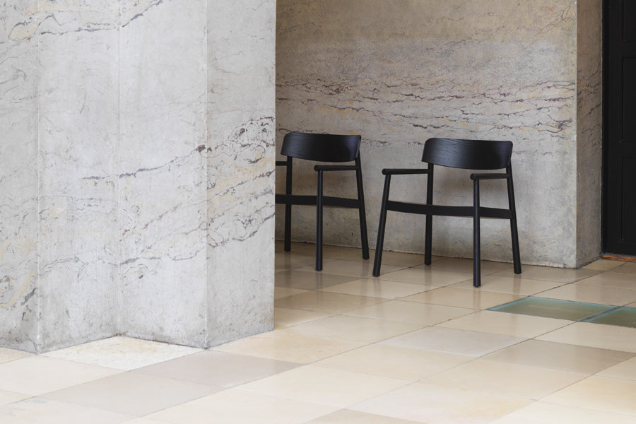 Timb Lounge Armchair by Normann Copenhagen, showing timb lounge armchairs in live shot.