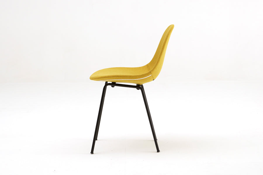 TA Upholstered Side Chair Er by Toou, showing side view of ta upholstered side chair er in black base, mustard shell seat.