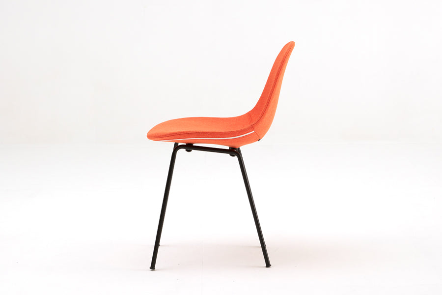 TA Upholstered Side Chair Er by Toou, showing side view of ta upholstered side chair er in black base, red shell seat.