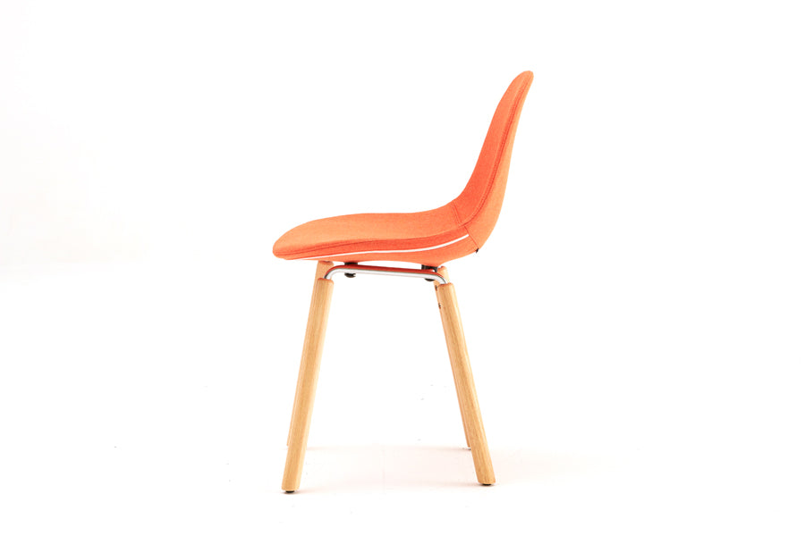 TA Upholstered Side Chair Er by Toou, showing side view of ta upholstered side chair er in chrome/natural oak base, red shell seat.