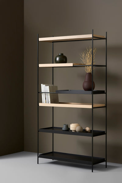 Tray Shelf by Woud, showing angle view of tray shelf in live shot.