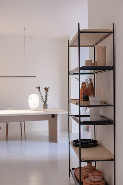 Tray Shelf by Woud, showing side view of tray shelf in live shot.